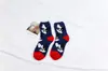 Nuevos calcetines de invierno de medio terciopelo calcetines de terciopelo de coral calcetines para dormir calcetines de suelo de terciopelo de coral calcetines especiales antiarañazos