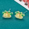 Pendientes navideños de nicho lindos pendientes de resina para perforación de oreja nuevos pendientes pequeños simples elegantes de moda para mujeres
