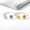 Anillo de Diseño Creativo Estilo Resort Francés Transfronterizo para Mujer Chapado en Oro Estrella de Mar Concha Incrustada con Circonita Anillo de Cola Ajustable