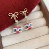 Pendientes de Moneda de León Esmaltados de Tendencia Nacional, Nuevo Estilo Chino, Pendientes Versátiles con un Ambiente de Estilo Nacional, Lujo Ligero y Sensación de Alta Gama