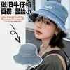 Sombrero de pescador bordado con lazo estilo coreano para mujer, para viaje, protección solar, visera, sombrero de cubo de mezclilla, moda, sombrero nuevo de verano