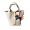2025 Nueva Bolsa Cesta de Verduras Primera Capa Patrón de Lichi Piel de Vaca Tendencia de Moda Gran Capacidad Estilo Casual Bolso Cubo Portátil