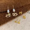 Conjunto de Brincos de Cavalo de Madeira com Moeda de Cobre Dourado Pérola para Mulheres, Agulha de Prata Nicho High-End Luxo Leve Exquisitos Retrô Versáteis
