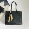 Bolso tote tejido de gran capacidad estilo europeo y americano transfronterizo, nueva colección otoño 2026, bolso de hombro y bolso de mano para mujer
