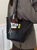 Bolso cruzado para mujer 2026 Diseño de nicho Bolso de axila francés Bolso de mano de alta gama Bolso de hombro retro a la moda para el trabajo