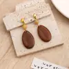 Pendientes de Madera Geométricos Transfronterizos Europeos y Americanos para Mujer, Pendientes de Madera Redondos con Diseño Hueco Exagerado Simple Retro Venta al por Mayor