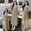 Doce Roupa de Maternidade Estilo Faculdade: Conjunto de Duas Peças: Camiseta Listrada de Manga Longa para Primavera e Outono com Saia de Suspensório Usável por Cima, Emagrecedor e que Cobre a Barriga