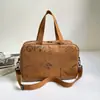 Bolso pequeño ovalado de piel suave para mujer, nuevo y moderno 2026, bolso tipo almohada de piel suave de gama alta de nicho, bolso de hombro y cruzado vintage