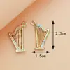 Fabricante de Accesorios para Instrumentos Musicales, Venta al por Mayor de Joyería DIY de Aleación Hecha a Mano, Accesorios para Joyería DIY con Goteo de Aceite