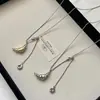 Collar Largo Desplegable Minimalista Coreano de Croissant y Donut para Mujer, Cadena de Suéter de Lujo Ligero de Nicho de Gama Alta