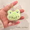 Colgante de peluche juguete pequeño llavero decoración de bolso restaurante llave de coche regalo pequeño regalo de graduación