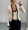 Conjunto de punto acanalado de dos piezas simulado con borde negro de estilo francés europeo y americano transfronterizo 2026 para mujer, vestido corto ajustado a la cintura de chicas europeas y americanas de moda
