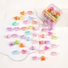 Al por mayor versión coreana de color caramelo dibujos animados clip flor pequeña estrella de cinco puntas pasador de princesa pinza de garra pasador femenino joya en caja