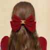 Horquilla con lazo rojo de Año Nuevo para mujer, para otoño e invierno, con clip para la parte posterior de la cabeza, para celebridades de Internet, con clip de primavera, accesorio para la cabeza sencillo.