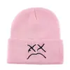 Artículo de moda de comercio exterior gorro de punto bordado de cara llorona para niños invierno expresión divertida unisex versátil gorro para exteriores