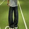 Jeans rectos de estilo americano de moda en tonos oscuros para hombre, temporada Primavera y Otoño 2026, diseño de alta gama con acabado lavado vintage y desgastado