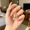 Corrente para Clavícula Personalizada, Simples, Versátil, Estilosa, Estilo Luxo Leve, Colar de Aço Titânio com Pérola e Estrela do Mar, Corrente de Pescoço Feminina Estilo Coreano