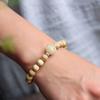 Libro Rojo Pequeño mismo estilo fragancia a leche pulsera de madera bebé niñaA cuentas de Buda de madera de agarwood pulsera de doble círculo Xingshi venta directa de fábrica
