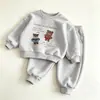 Conjunto de Moletom Masculino Primavera e Outono 2026 Novo Estilo Coreano Moda Casual Calça Conjunto Esportivo Duas Peças Estiloso para Bebê