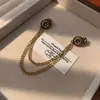 Nova Broche de Corrente Vintage Minimalista para Mulheres, Broche de Girassol de Bronze, Acessório Unissex para Terno e Casaco Atacado