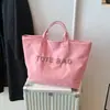 Bolsa Tote de Grande Capacidade para o Dia a Dia de Mulheres 2025 Novo Estilo Simples Casual Retrô High-End Versátil Bolsa de Ombro de Mão