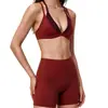 Nuevo traje deportivo bicolor para mujer, a prueba de impactos, de soporte, transpirable, sujetador deportivo y shorts de yoga de dos piezas falsos