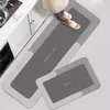 Tapete de Piso para Cocina de Lodo Diatómico Transfronterizo Tira Larga Absorción de Agua Absorción de Aceite Secado Rápido Antideslizante Almohadilla para Pies Juego de Tapetes para Puerta de Cocina de Color Sólido