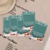 Llaveros navideños más vendidos transfronterizos con tarjetas de bendición, con diseños de Santa Claus y muñeco de nieve de dibujos animados, perfectos como adornos temáticos navideños