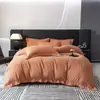 Conjunto de quatro peças outono e inverno alta qualidade lixado espesso capa de edredom lençol de cama capa de edredom cor sólida bordado roupa de cama conjunto de quatro peças