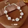 Pulsera de flor de calcedonia redonda con circonita microincrustada, estilo frío de lujo ligero, pulsera exquisita, joyería de moda versátil de alta gama