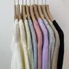 Modelo de Pedido Estilo Coreano 2026 Nueva Llegada, con Lana Fina, Diseño Minimalista de Cuello V Adelgazante, Cardigan de Punto Versátil para Mujer