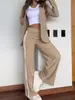 Traje casual transfronterizo europeo y americano con rayas laterales, blazer, pantalones de pierna ancha con abertura, conjunto popular de dos piezas para mujer para ir al trabajo