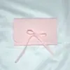 Bolsa de flanela de microfibra de fábrica armazenamento de joias embalagem de vendas bolsa com aba de laço bolsa antipoeira para joias atacado