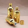 Botella de vidrio dorada galvanizada 5ml10ml multi-especificación botella cosmética de vidrio botella de aceite esencial de vidrio fabricantes al por mayor