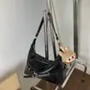 Bolso de mano de nicho vintage de alta gama transfronterizo para mujer, nuevo bolso cruzado versátil otoño/invierno 2026, bolso de hombro para mujer y bolso de axila