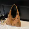 Bolsa Tote Versátil de Veludo de Camurça com Alça Única 2025 Nova Bolsa Tote Vazada Bolsa de Ombro Cruzada para Mulheres