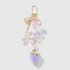 Nuevo Estilo Miu Dulce y Exquisito Moda Cadena Dorada Resina Lazo Artificial Fresa Llavero DIY