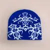 Nuevo patrón gorro de punto estilo europeo y americano de nicho para hombres y mujeres cálido personalidad hip-hop rap gorro pullover para exteriores venta al por mayor