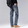 Moda popular para hombre / Nueva colección Primavera/Otoño 2026: pantalones de mezclilla elásticos para hombre, tiro medio a alto, ligeros, estilo casual de negocios, corte ajustado, versátiles