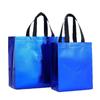 Bolsa no tejida láser transfronteriza en stock impermeable protección ambiental bolsa de compras de supermercado recubierta aluminizada bolsa de mano para tienda de ropa