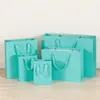 Bolsa de papel kraft para regalo, venta al por mayor, para ropa, flores, compras, gafas, etc.