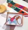 H casa costurado à mão alta qualidade pele de ovelha Anjo Pégaso bolsa pingente fofo feminino bolsa de mão ornamentos chaveiro de carro