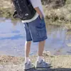 Verano 2026 Nuevos Shorts de Mezclilla Holgados de Estilo Hongkonés de Moda para Hombre con Cintura Elástica y Cordón
