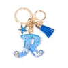 Llavero Colgante Temático Océano Azul con Borla de Estrella de Mar, Llavero de Resina Encanto para Bolso con 26 Letras
