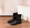 Botas de caña alta versátiles minimalistas estilo uva estilo coreano punta redonda elásticas adelgazantes botas cortas botas de tacón oculto mujer