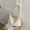 Bolso tote versátil y sencillo para mujer, nuevo modelo 2026, versátil bolso de axila de gran capacidad para el trabajo y los desplazamientos, bolso de hombro y cruzado