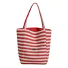 Nueva bolsa de lona de doble cara a rayas de bloques de color más vendida transfronteriza, gran capacidad, adecuada para ir al trabajo y uso casual, bolso de hombro para mujer