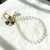 Cadena Minimalista para Teléfono con Perlas y Lazo, Correa de Muñeca, Cadena de Mano, Portacámaras y Llavero para Mujer