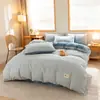 Conjunto de cama minimalista de algodão puro personalizado de quatro peças lençol de cama de dormitório capa de edredom conjunto de três peças para estudantes lençol com elástico fabricante de roupa de cama atacado