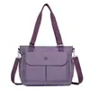 Bolso de mano casual y minimalista para mujer, bolsa tote de gran capacidad, bolso de hombro multibolsillos para madres de mediana edad, bolso cruzado para viajes al aire libre